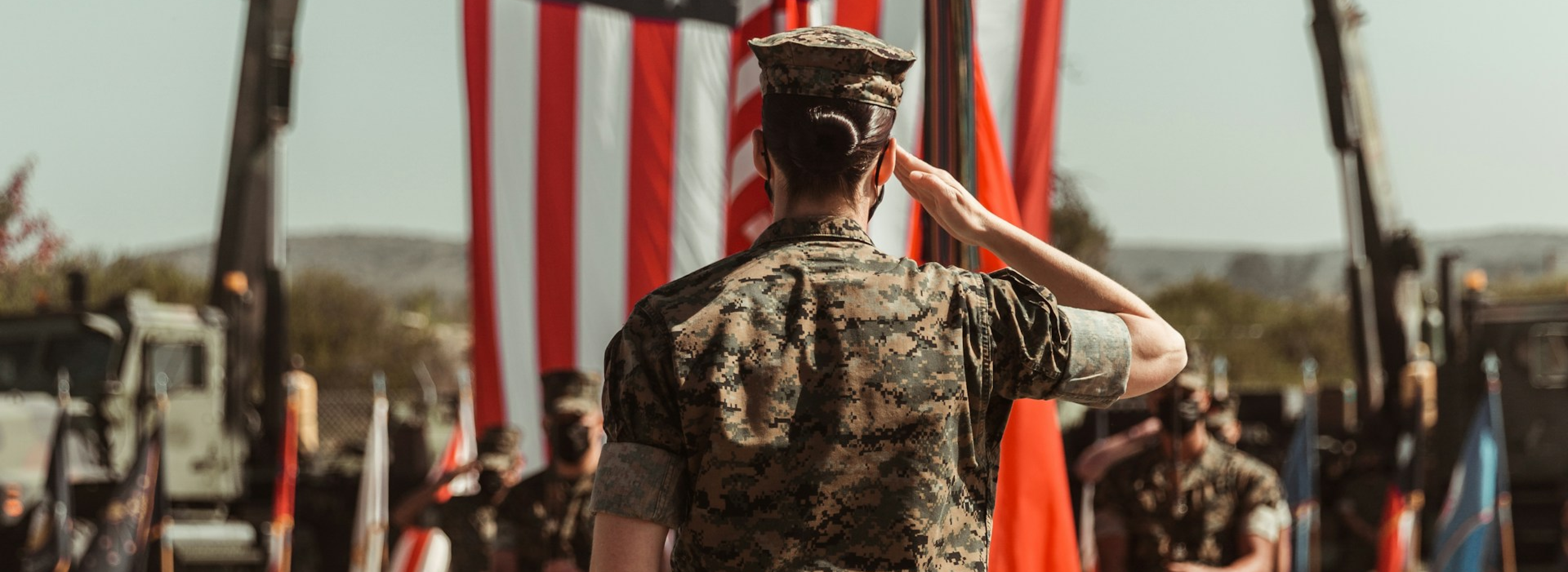 Female US soldier saluting